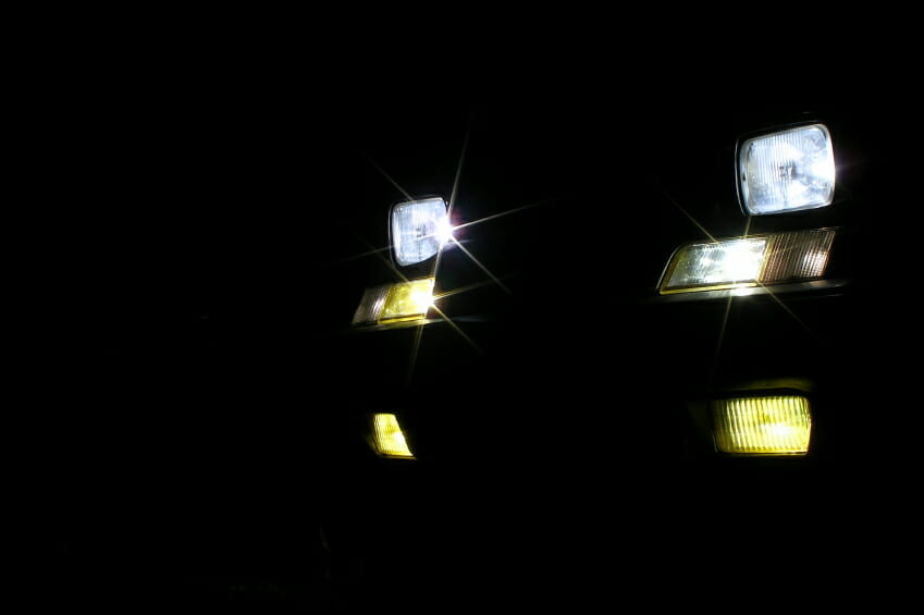 is it illegal to flash your headlights to warn of police