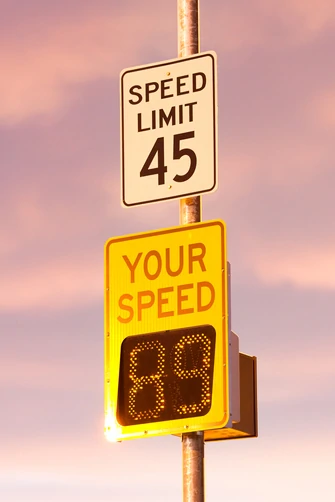 radar speed limit sign showing 89 in a 45